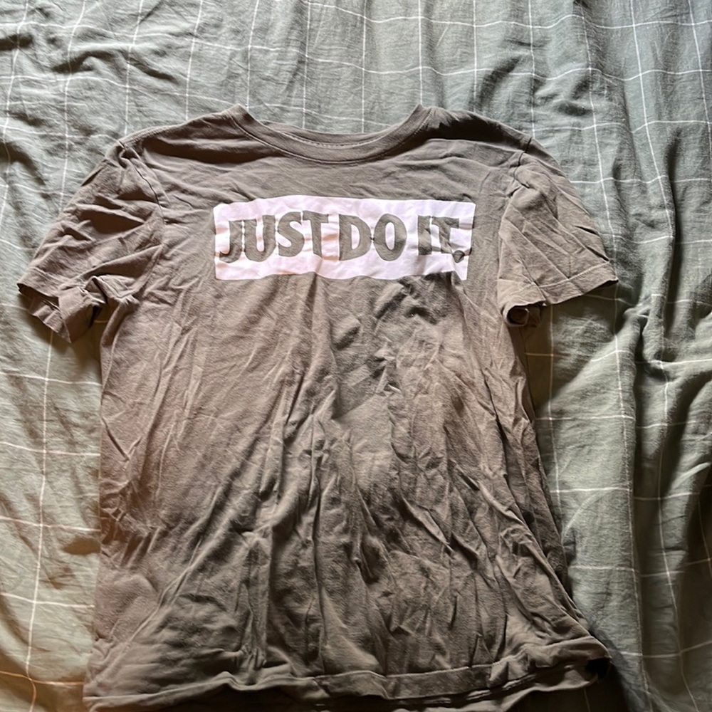 The Nike Tee shirt, size medium